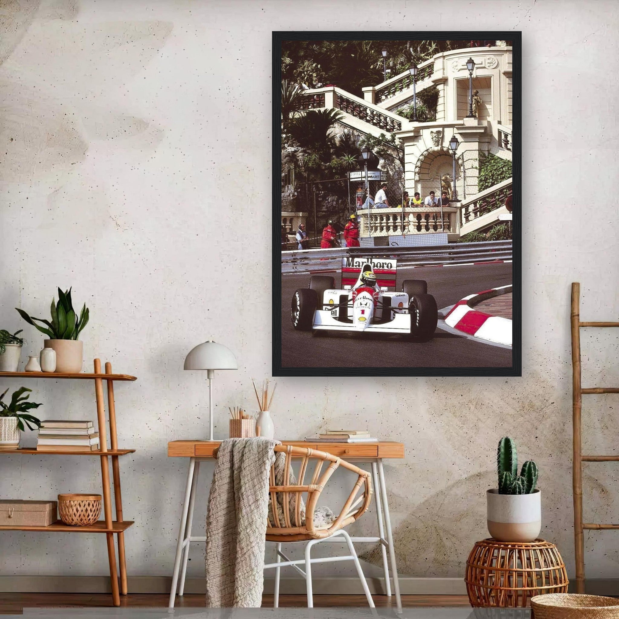 Ayrton Senna framed print capturing his iconic moment at the Monaco Grand Prix, showcased in a stylish interior setting.