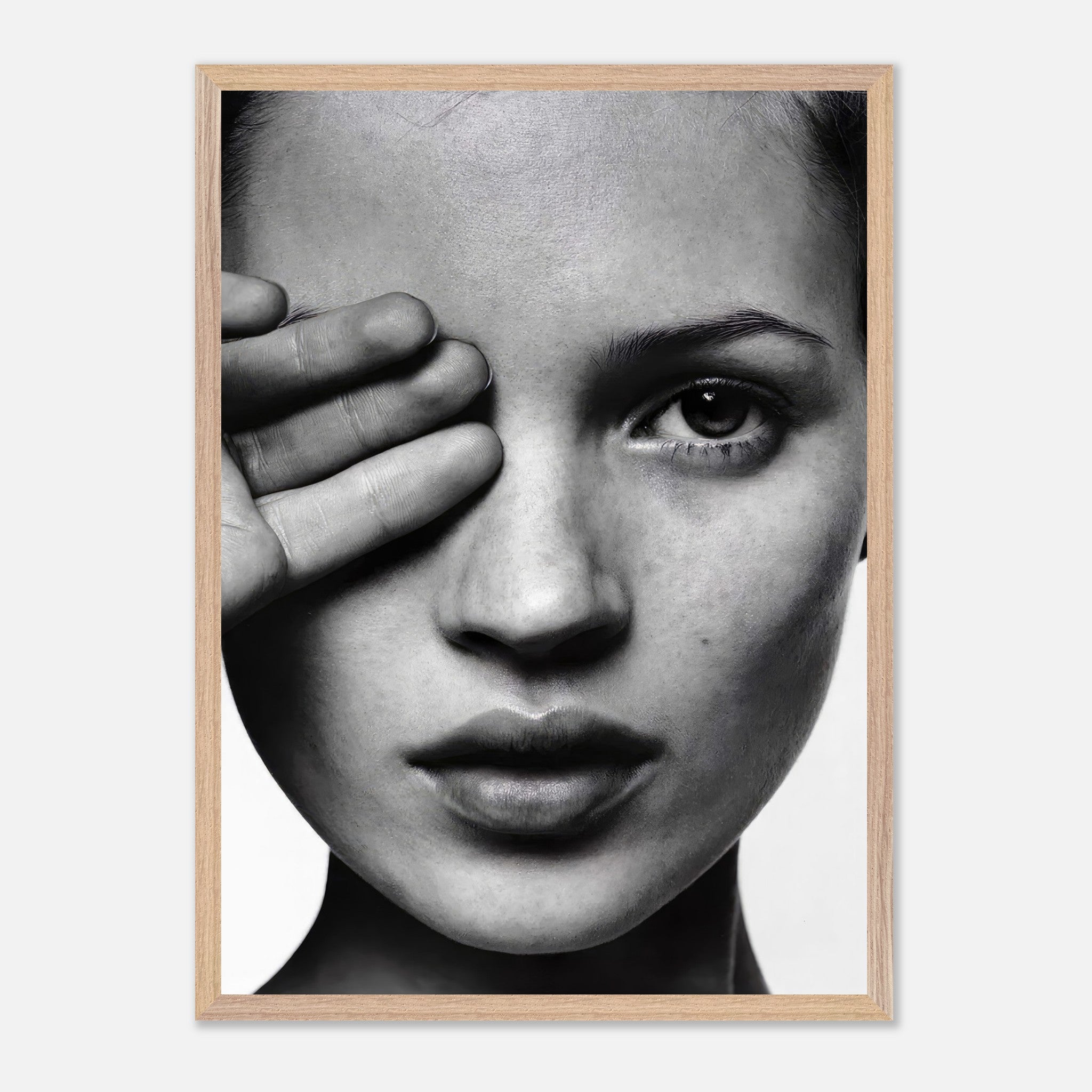 Kate Moss black and white vintage framed print featuring a striking close-up portrait. Timeless elegance for home decor.