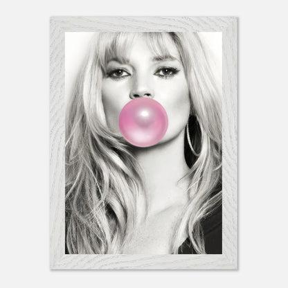 Kate Moss vintage framed print with pink bubble gum, showcasing timeless style and playful elegance. Perfect for modern decor.