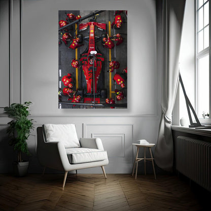 Formula 1 pitstop artwork featuring a Ferrari car in vibrant red, captured in brushed metal print, enhancing modern decor.