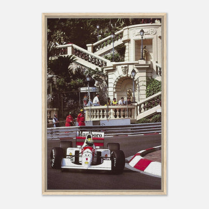 Framed canvas print of Ayrton Senna racing in Monaco, showcasing vibrant colors and iconic motorsport artistry.