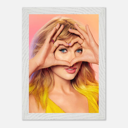 Taylor Swift vintage framed print with heart-shaped hand gesture, vibrant colors, perfect for fans and collectors.