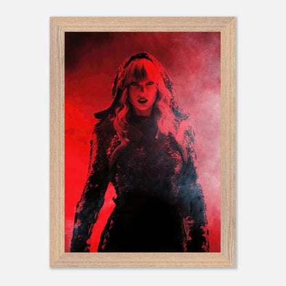 Vintage framed print of Taylor Swift in dramatic red lighting, capturing the essence of her "Red" era performances.