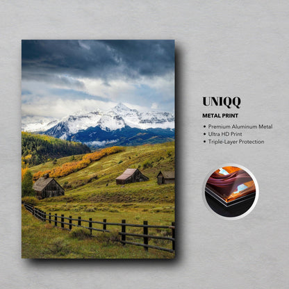 Telluride, Colorado metal print showcasing snow-capped mountains, rustic barns, and vibrant autumn scenery.