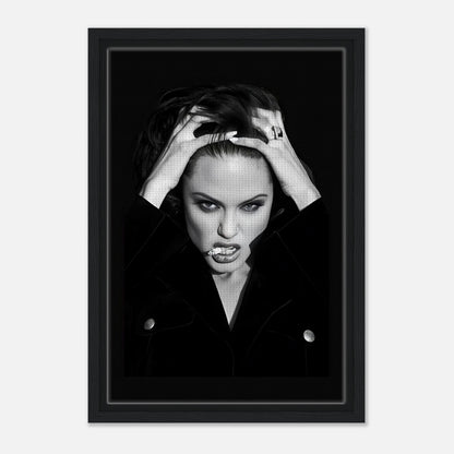 Angelina Jolie smoking framed canvas print showcasing elegance and rebellion in striking black and white tones.