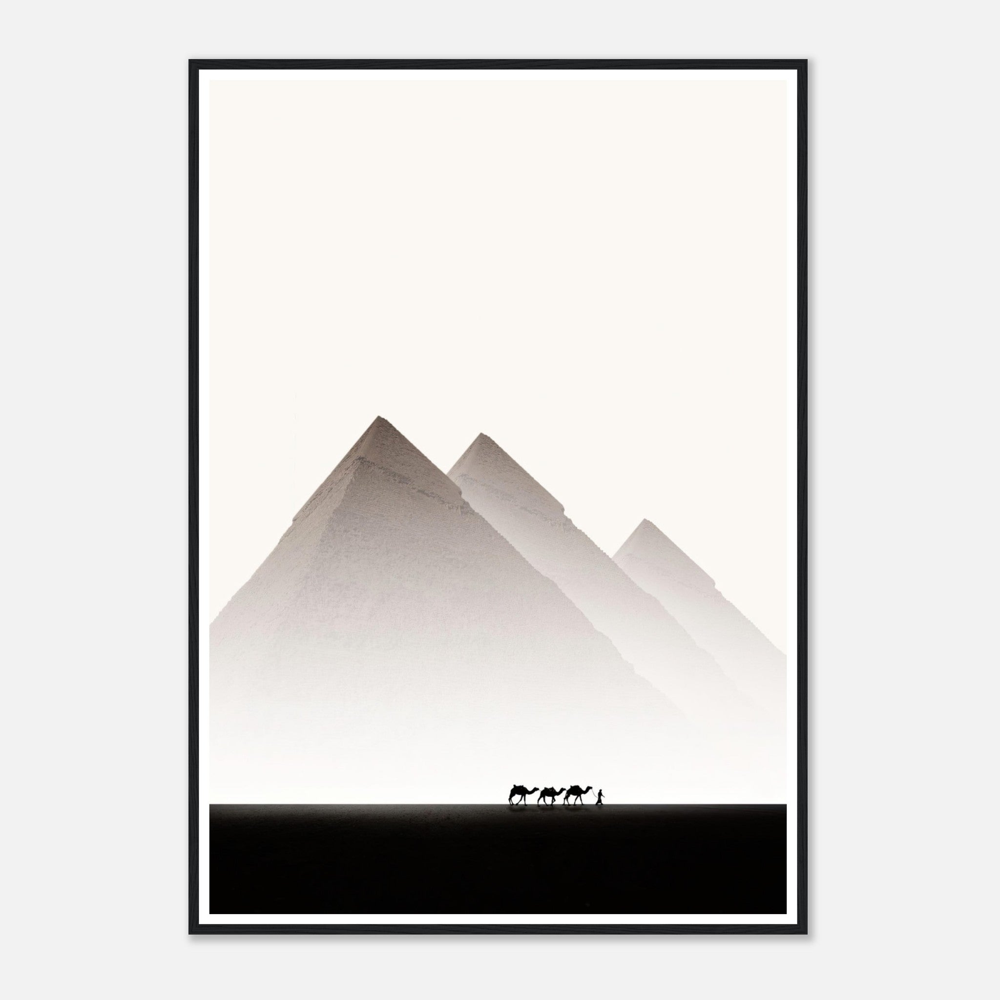 Framed print of the Pyramids of Giza with silhouetted camels against a minimalist desert backdrop.