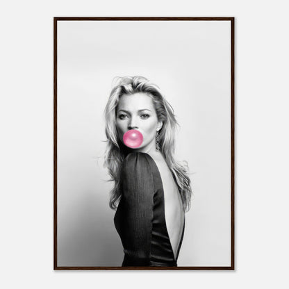 Kate Moss framed print in black and white with vibrant pink bubblegum, showcasing modern pop art elegance.