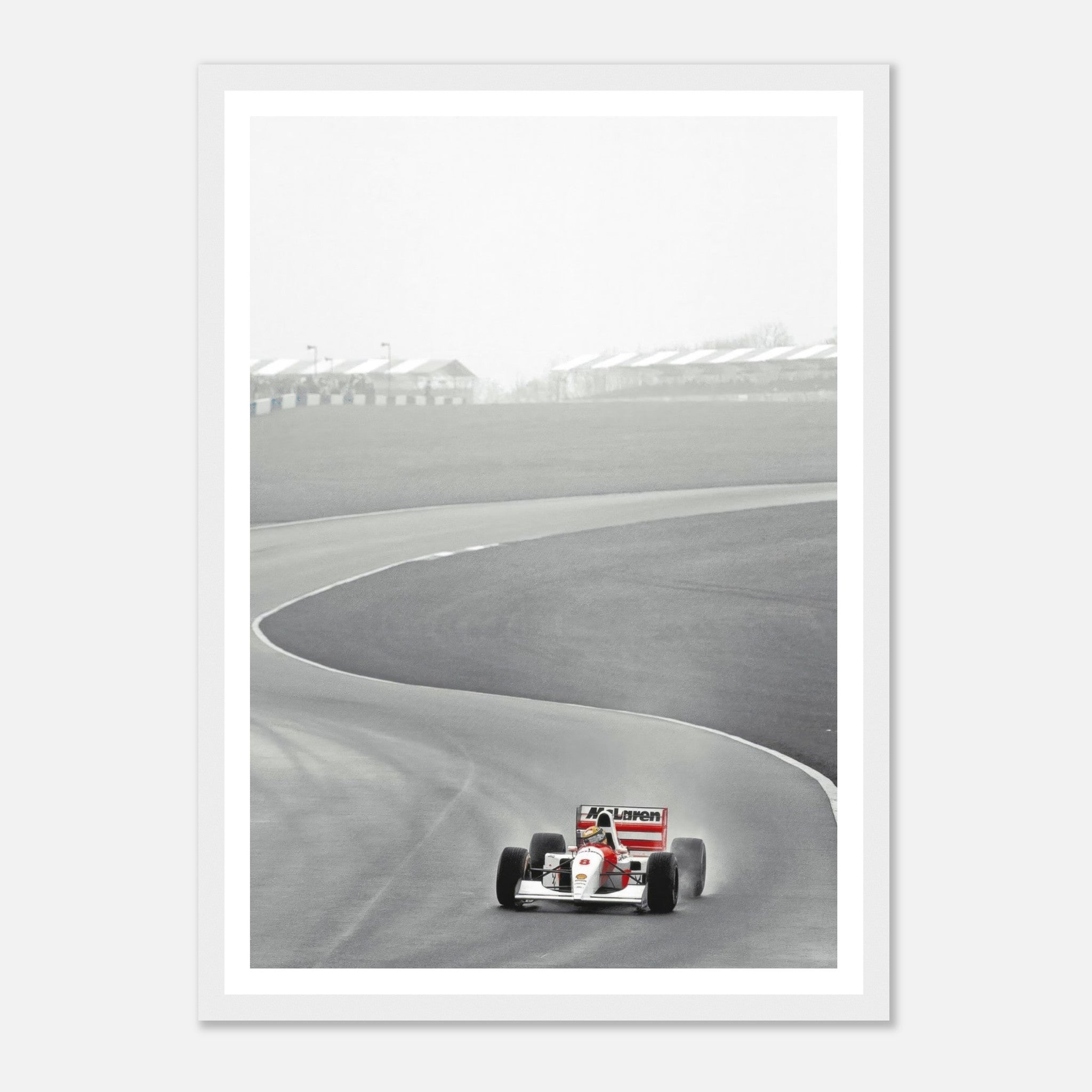 1988 Ayrton Senna driving McLaren MP4/4 on track in black and white framed print, capturing motorsport history.