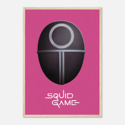 Squid Game Guard Mask Framed Print on pink background, featuring iconic design for fans of the Netflix series.