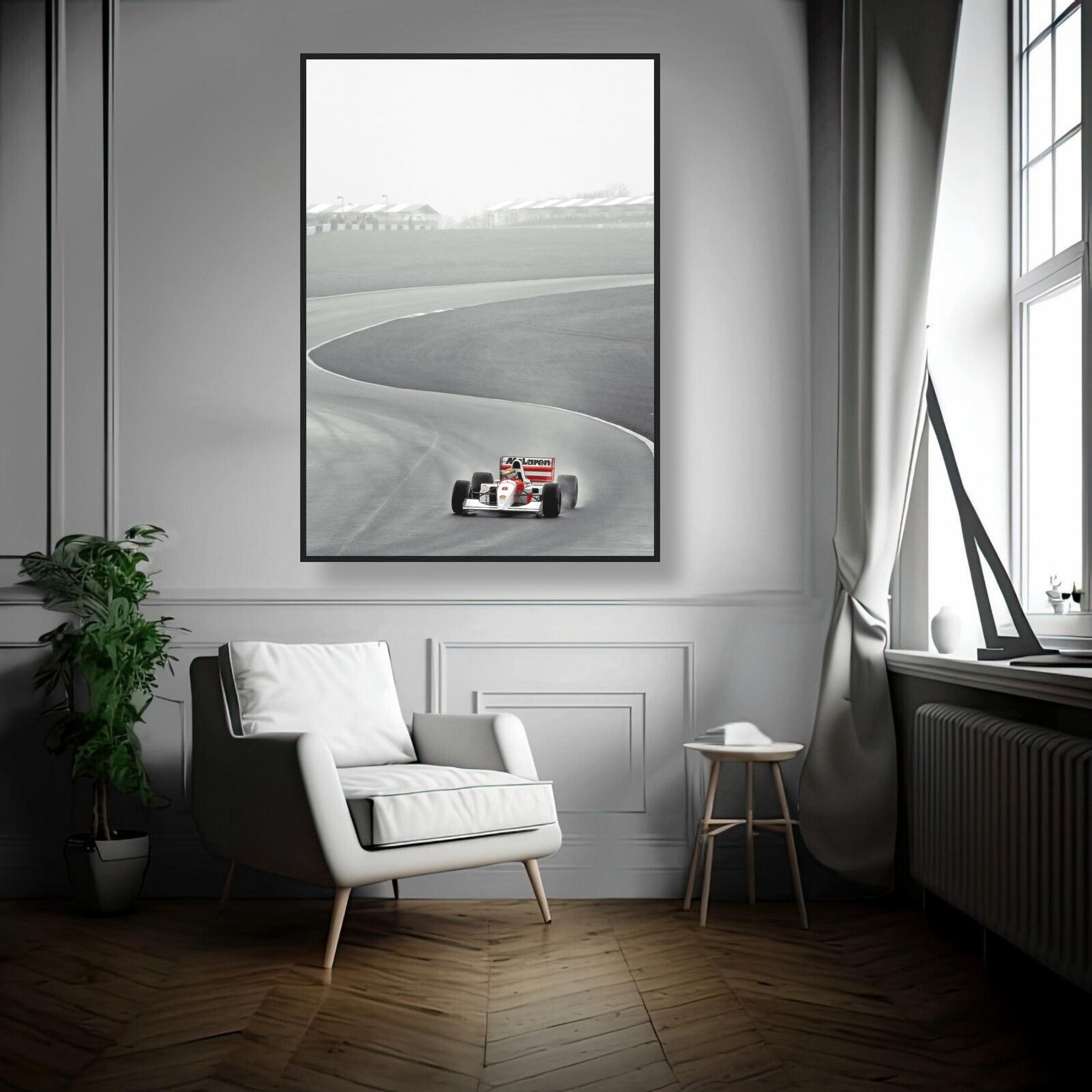 Framed 1988 Ayrton Senna McLaren photography in a modern living room setting, showcasing racing history in black and white.