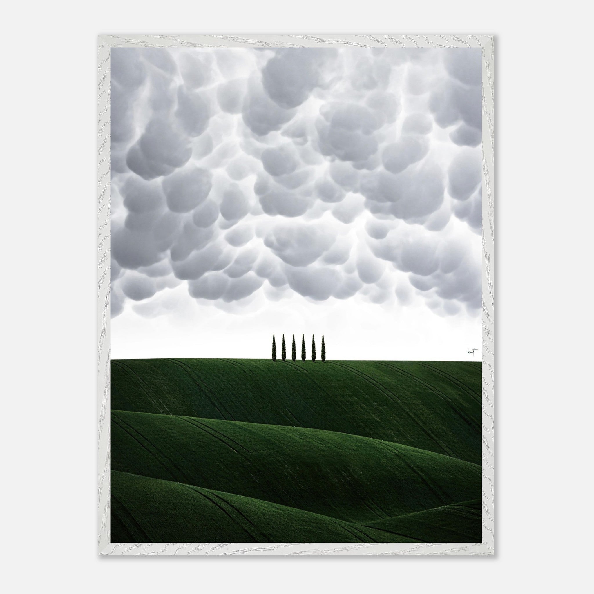 Toscana vintage framed art featuring green rolling hills and cypress trees against a dramatic cloud-filled sky.