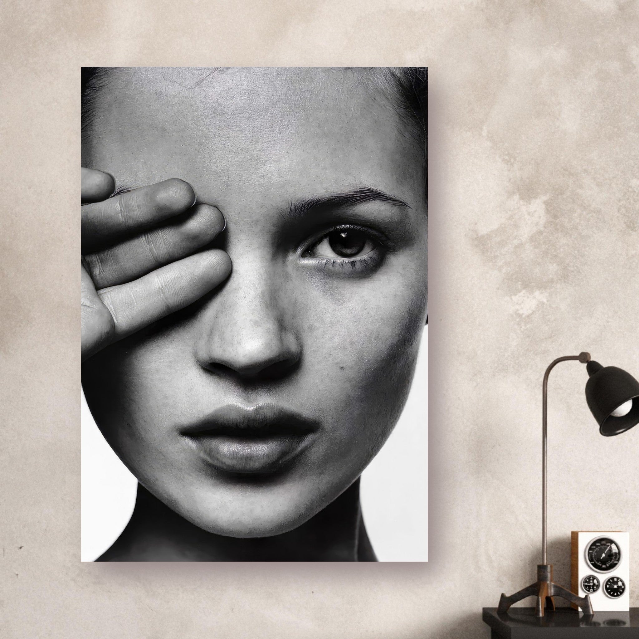 Black and white photography poster of a woman's face, showcasing elegance and timeless beauty in minimalist decor.