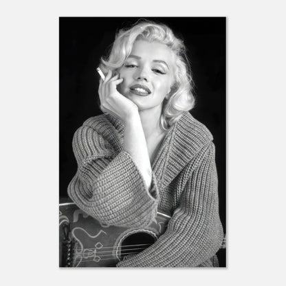 Marilyn Monroe smoking while wearing a cozy sweater, captured in black and white on a metal print.