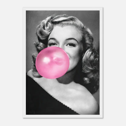 Marilyn Monroe blowing pink bubble gum in a glamorous black and white framed print, adding quirky elegance to any décor.