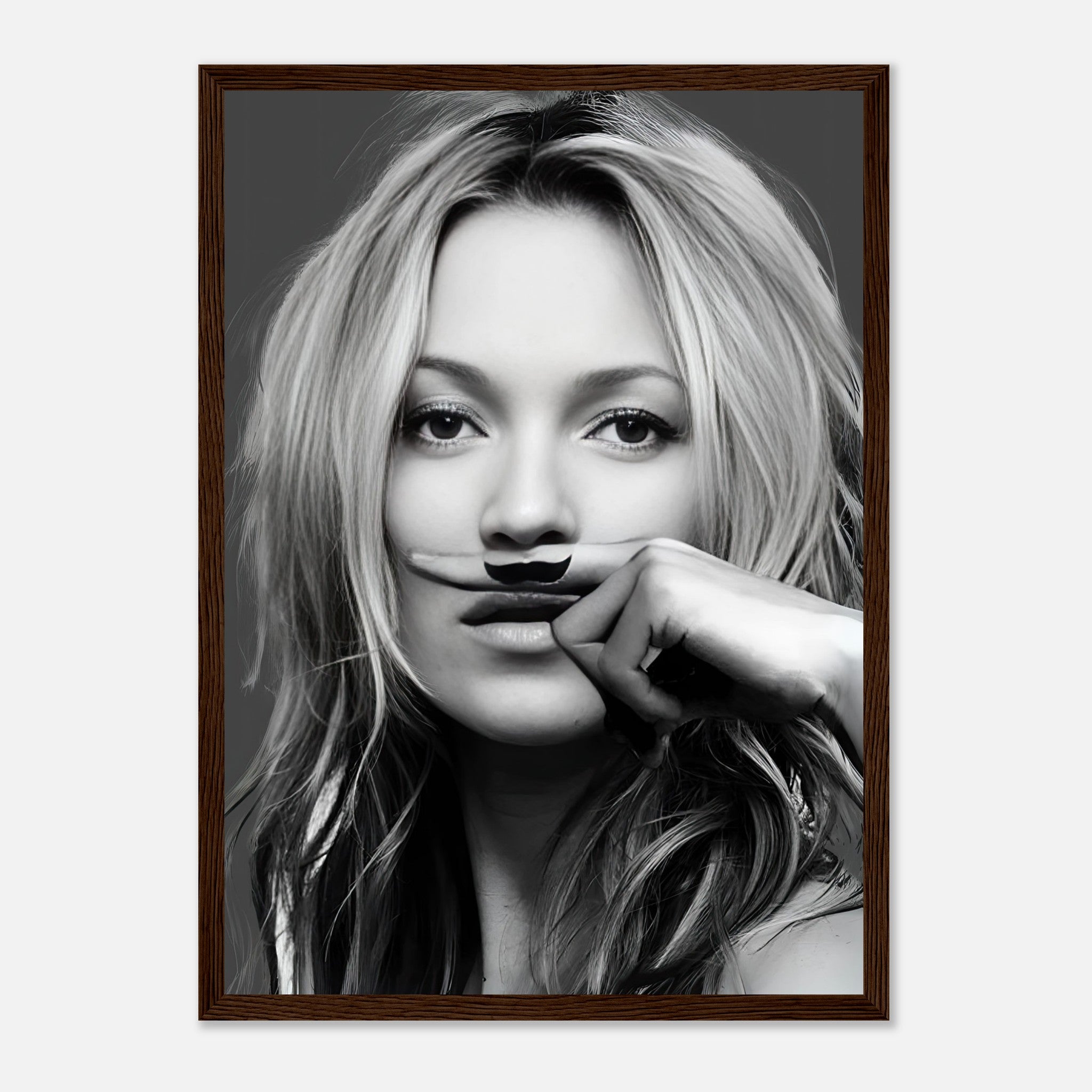 Framed black-and-white portrait of a woman with a playful mustache, adding humor and elegance to any decor.