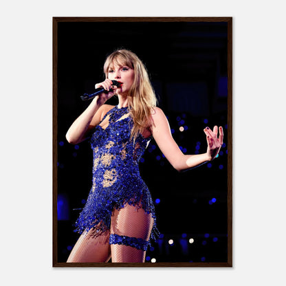 Taylor Swift performing in a dazzling blue outfit, captured in a stunning framed print for fans and music lovers.