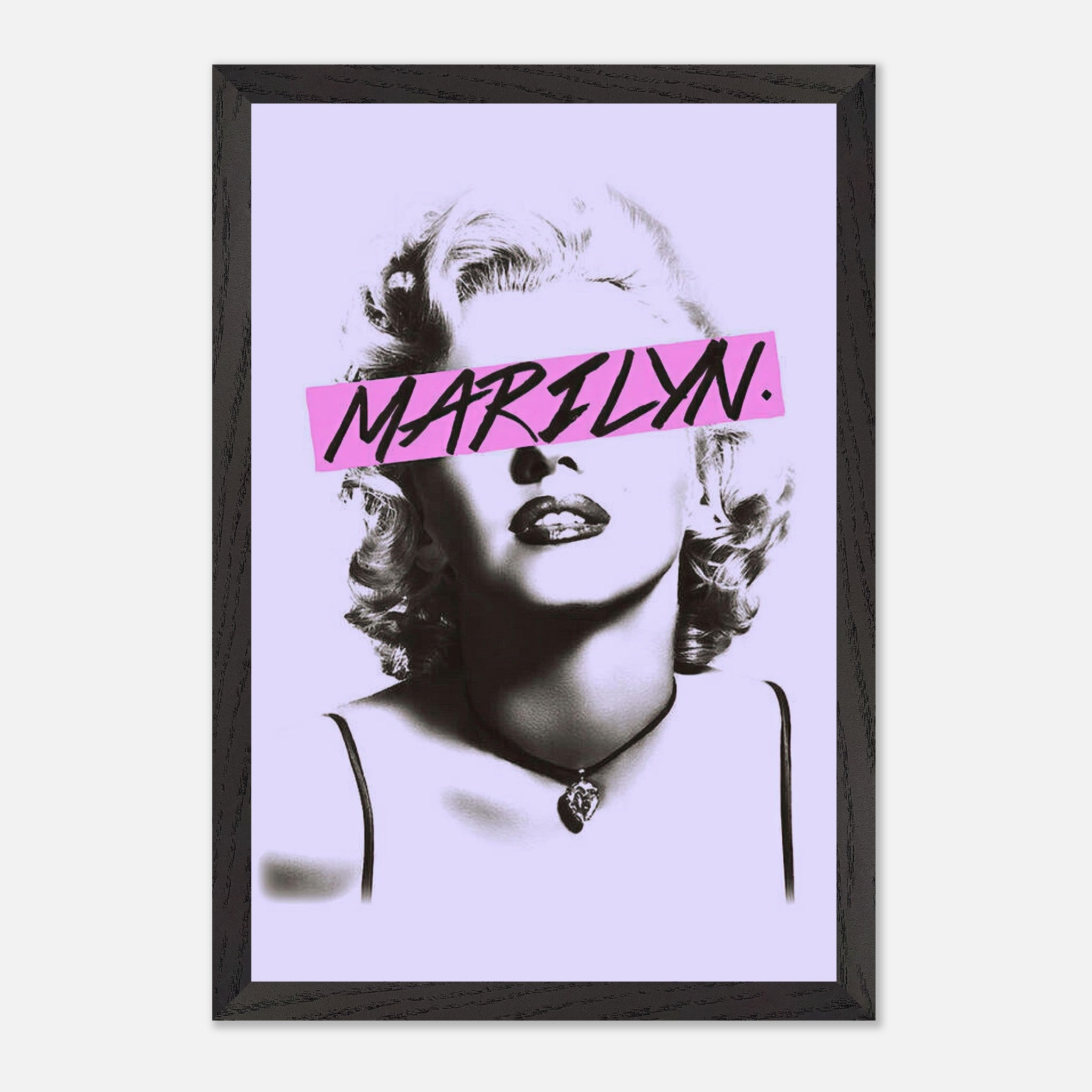 Vintage Marilyn Monroe framed print with a bold pink graphic detail on a black-and-white image, perfect for modern decor.