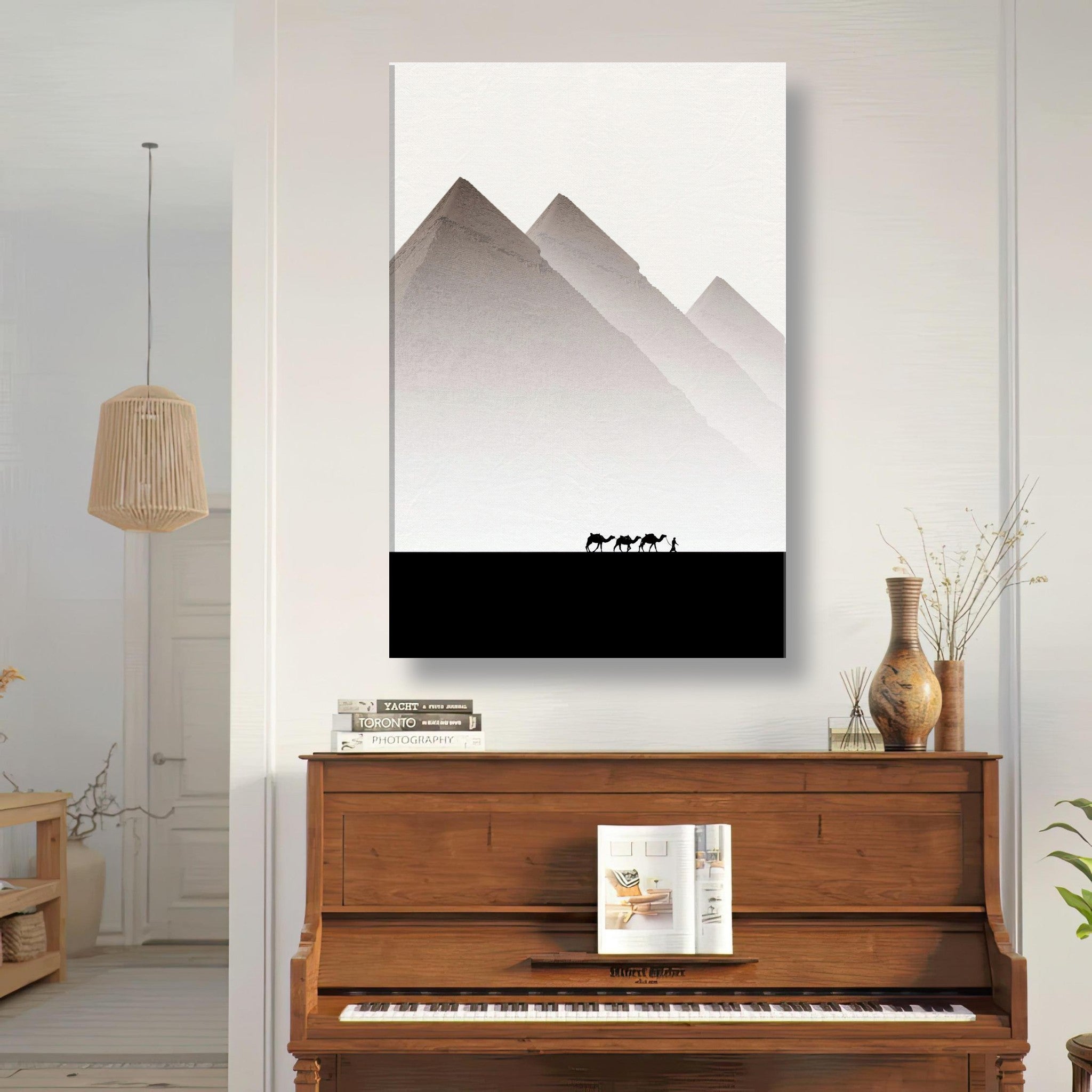 Minimalist canvas artwork of the Pyramids of Giza with camels, showcasing elegance in a modern living space.