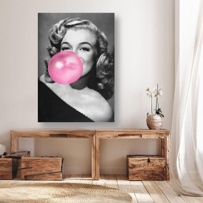 Marilyn Monroe Bubble Gum poster decor in a modern living room setting, featuring a vintage black and white image with pink gum.