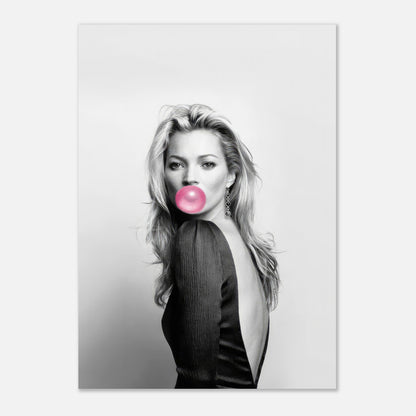 Black-and-white portrait of Kate Moss blowing a pink bubble, showcasing edgy sophistication and contemporary art.