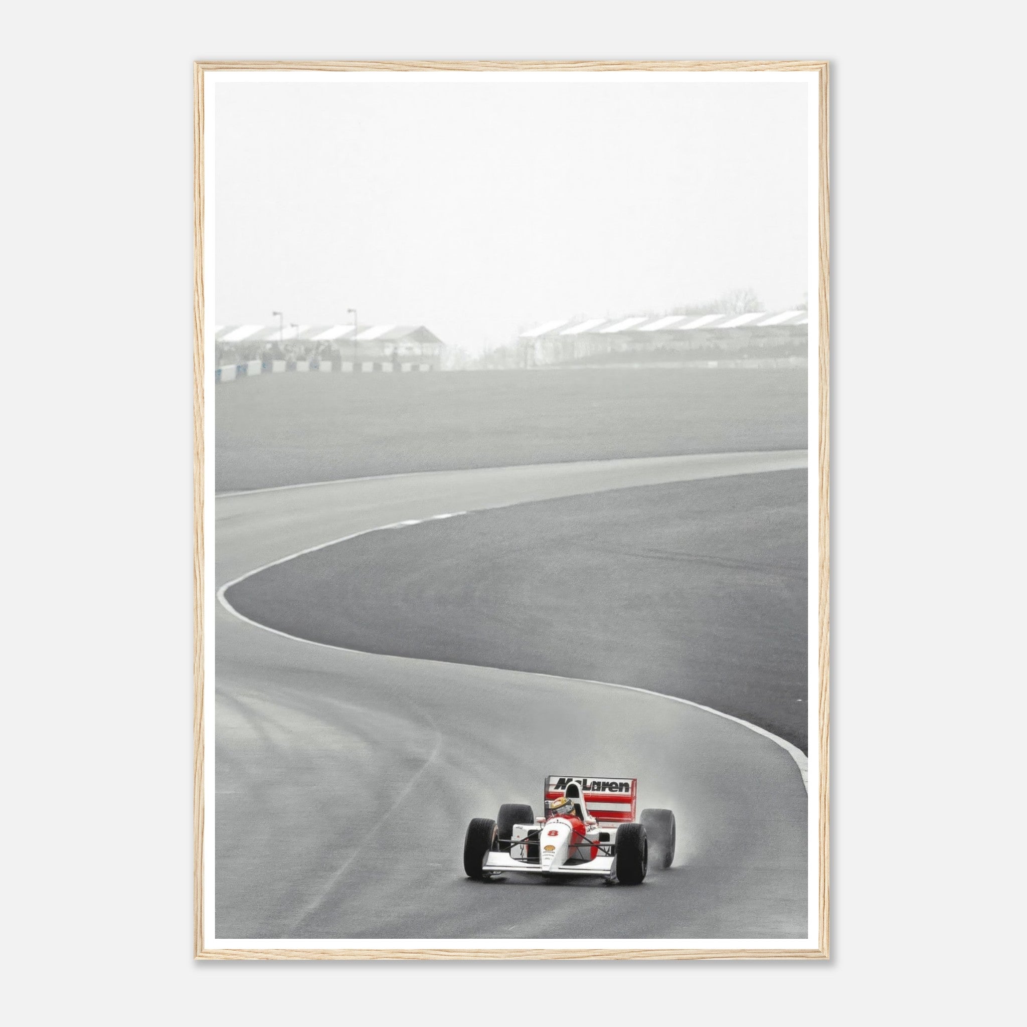 1988 Ayrton Senna McLaren MP4/4 framed print capturing racing history on track in black and white.